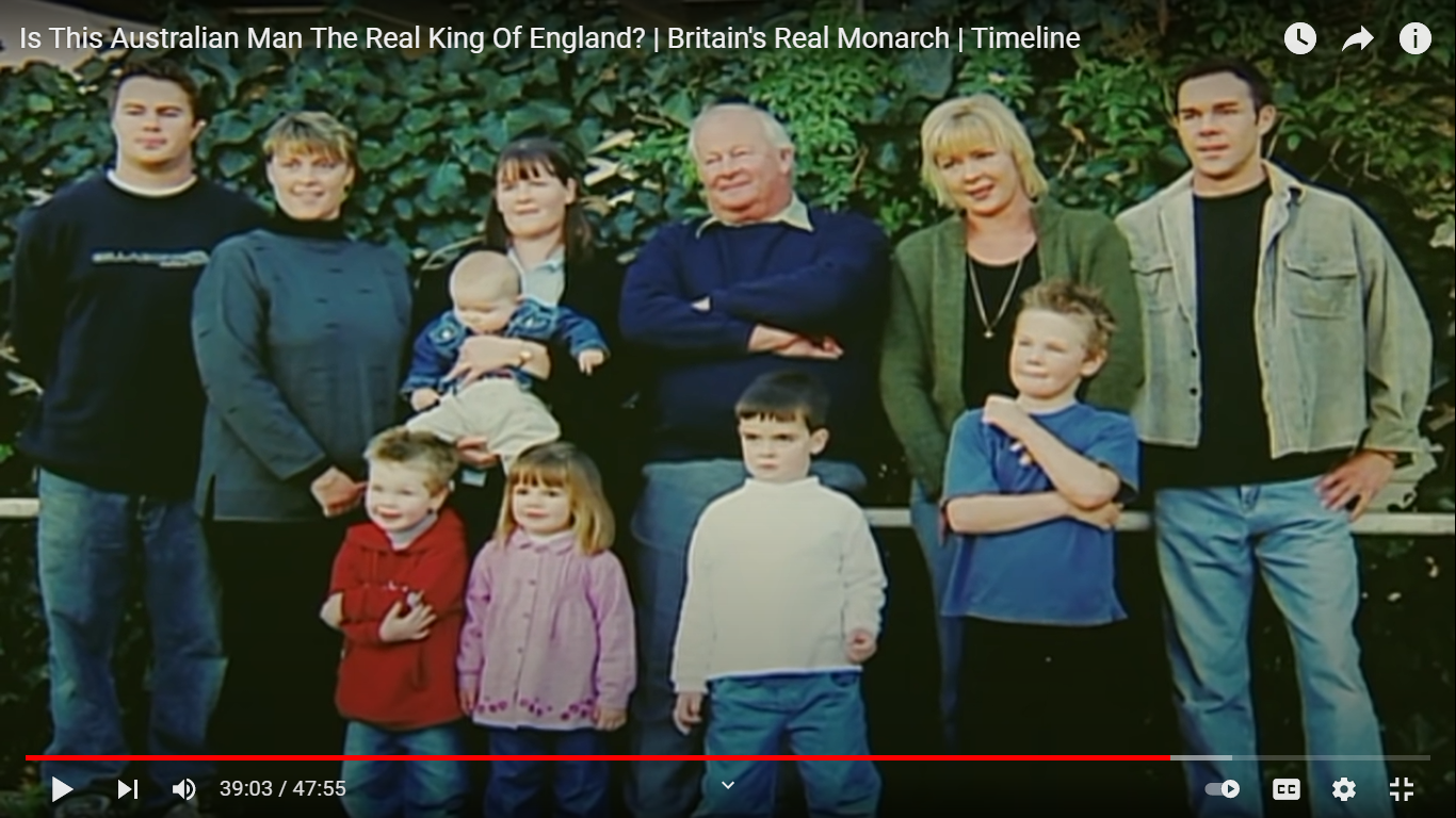 A group of people posing for a photo

Description automatically generated