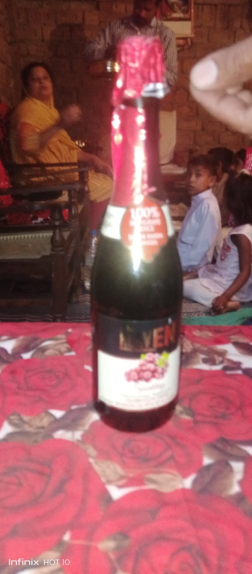 A bottle of alcohol

Description automatically generated with low confidence