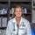 A person in a white lab coat

Description automatically generated